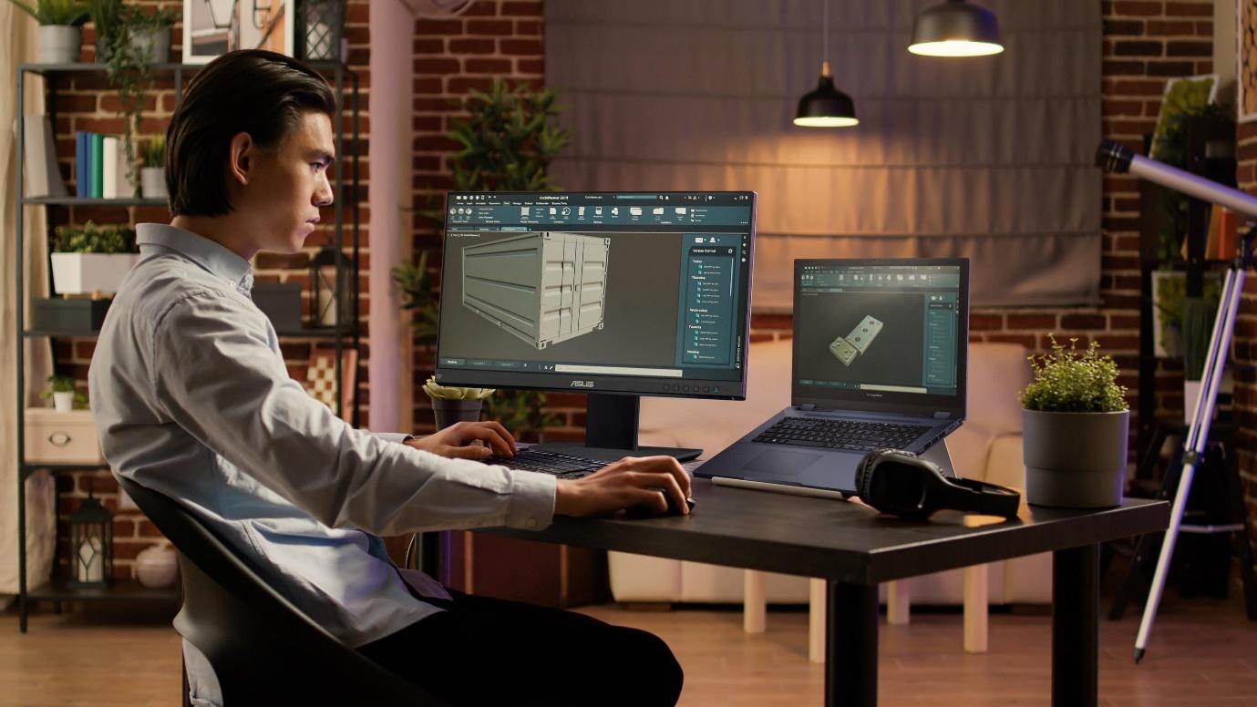A person working on a computer
Description automatically generated with low confidence